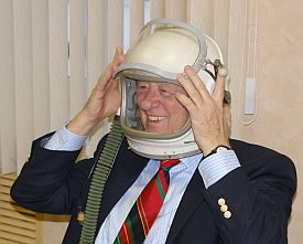 Ken Green wearing a fighter pilot's helmet.