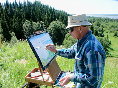 Milt Christianson at his easel in Russia