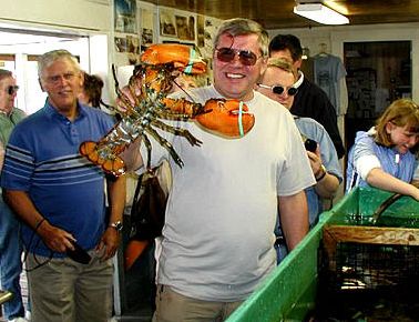 Shashurin holding a lobster.