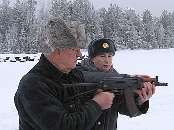 Ken Green holding an AK-47.
