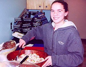 Making potato salad for lunch. Photo by Mary Coombs (2003)